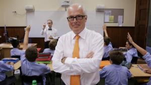You can’t end up allowing the tail to wag the dog’: Sydney Grammar principal John Vallance with Latin teacher Paul Reisner and his Year 7 students. Picture: Brad Hunter